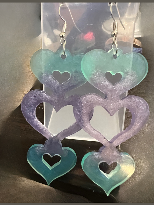 Teal and purple triple hearts